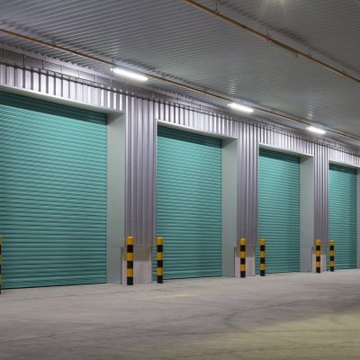 Shutter door or roller door and concrete floor outside factory building use for industrial background.